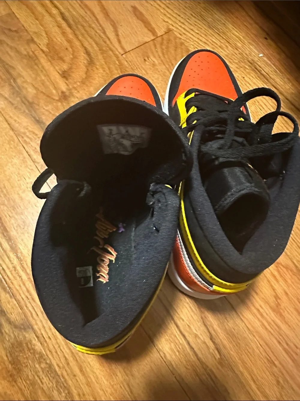 Jordan mens Nike Colorblocked High-Top Sneakers in Black, Orange & Yellow